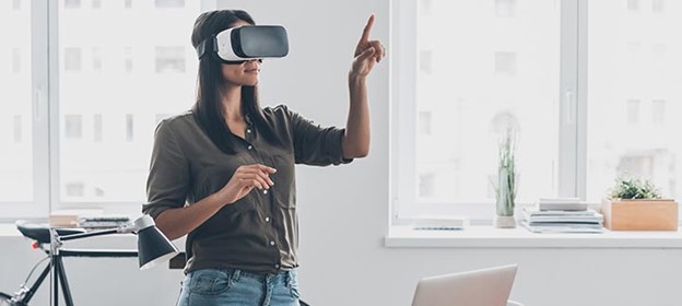 Woman using virtual reality equipment